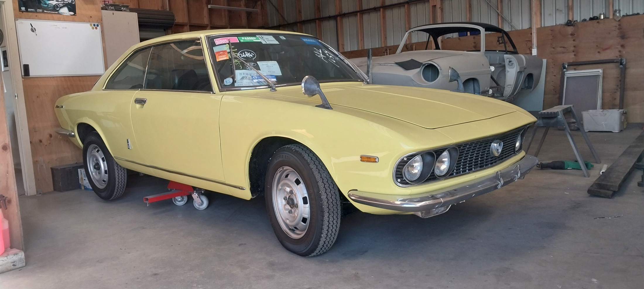 Classic Mazda Luce in the Panel Beating Services workshop